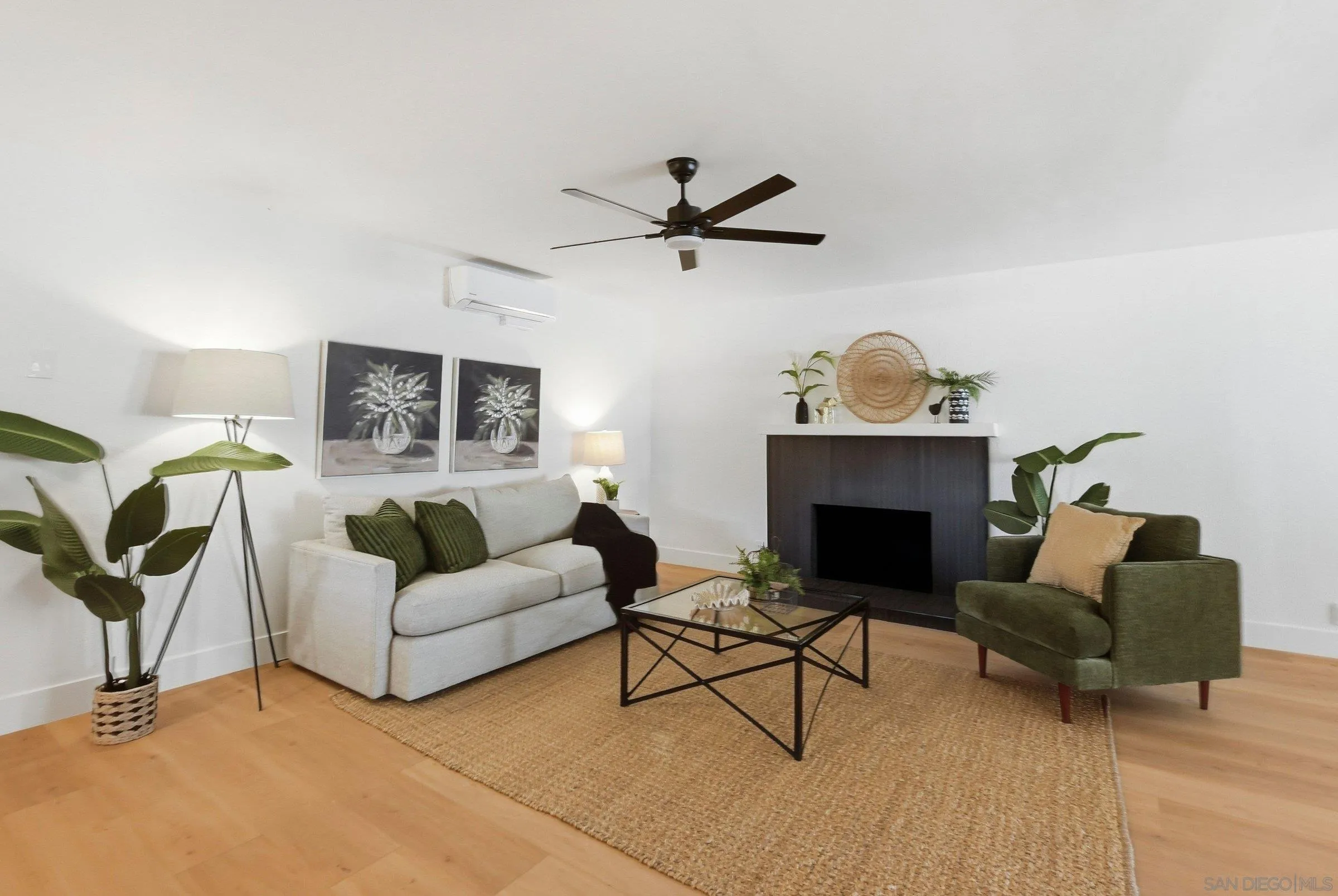 646 Barsby Street Vista, CA 92084 - Photo 23 of 48 a living room with furniture and a fireplace