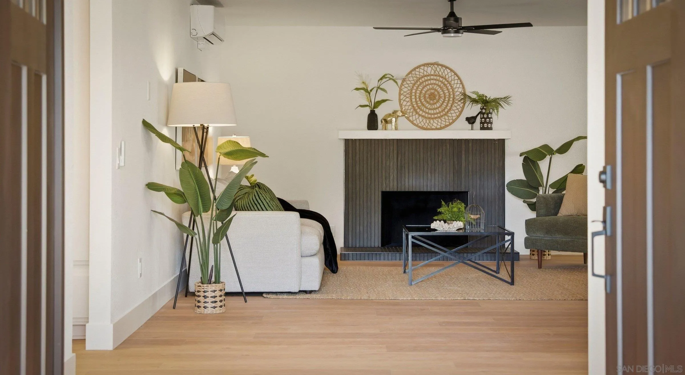 646 Barsby Street Vista, CA 92084 - Photo 34 of 48 a living room with furniture and a fireplace