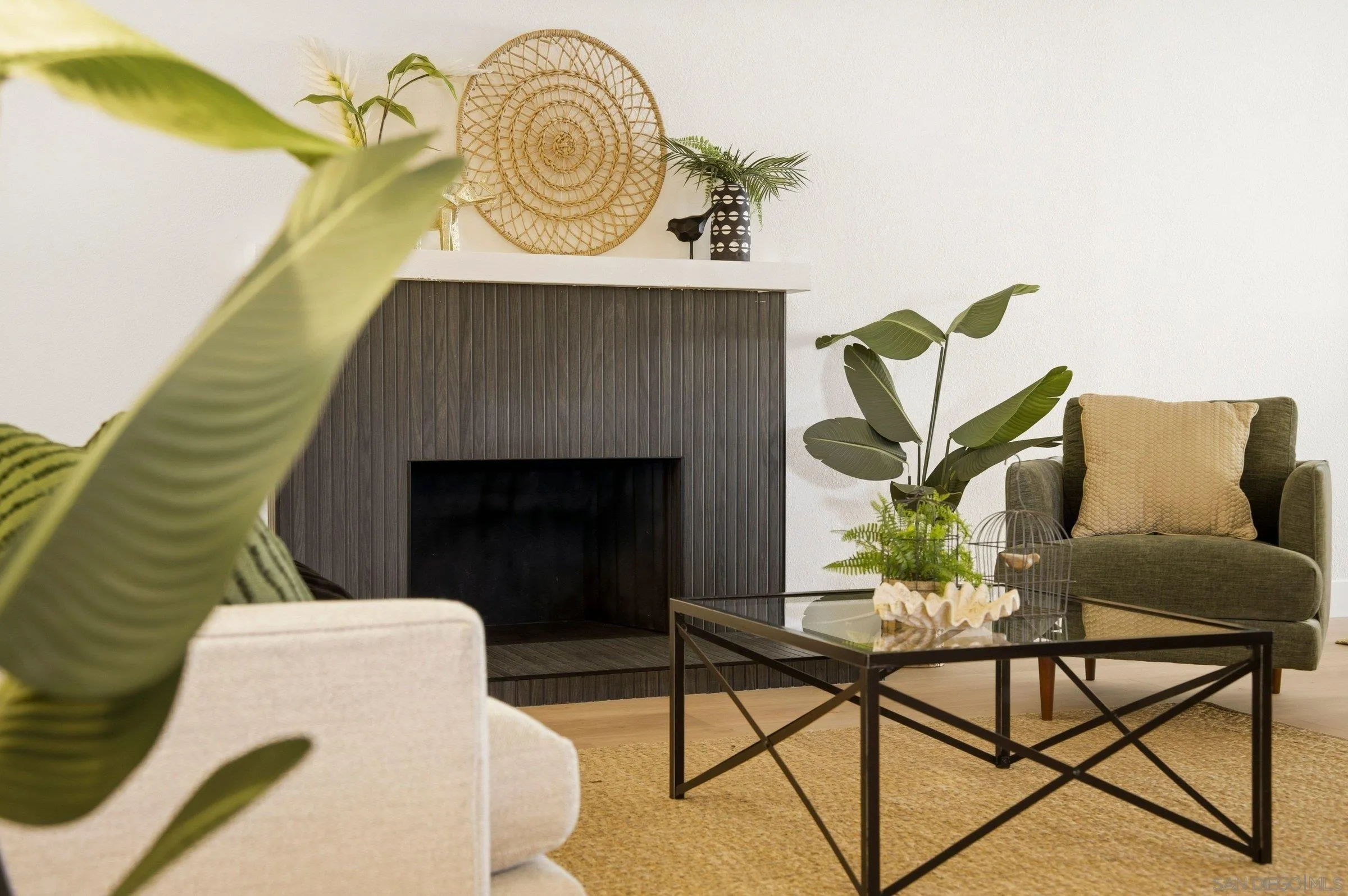 646 Barsby Street Vista, CA 92084 - Photo 37 of 48 a living room with furniture and a fireplace