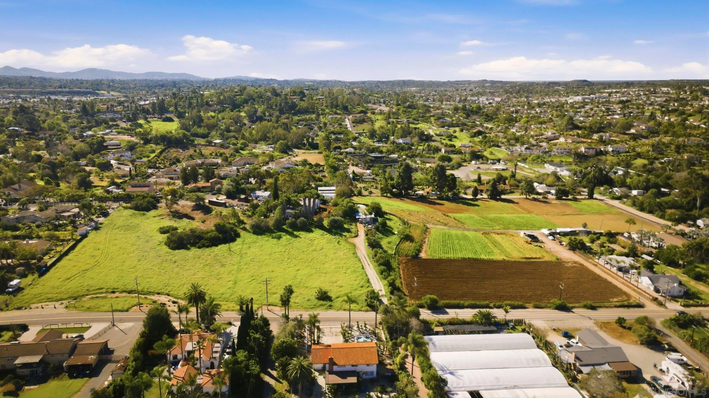 646 Barsby Street Vista, CA 92084 - Photo 47 of 48 an aerial view of residential houses with outdoor space