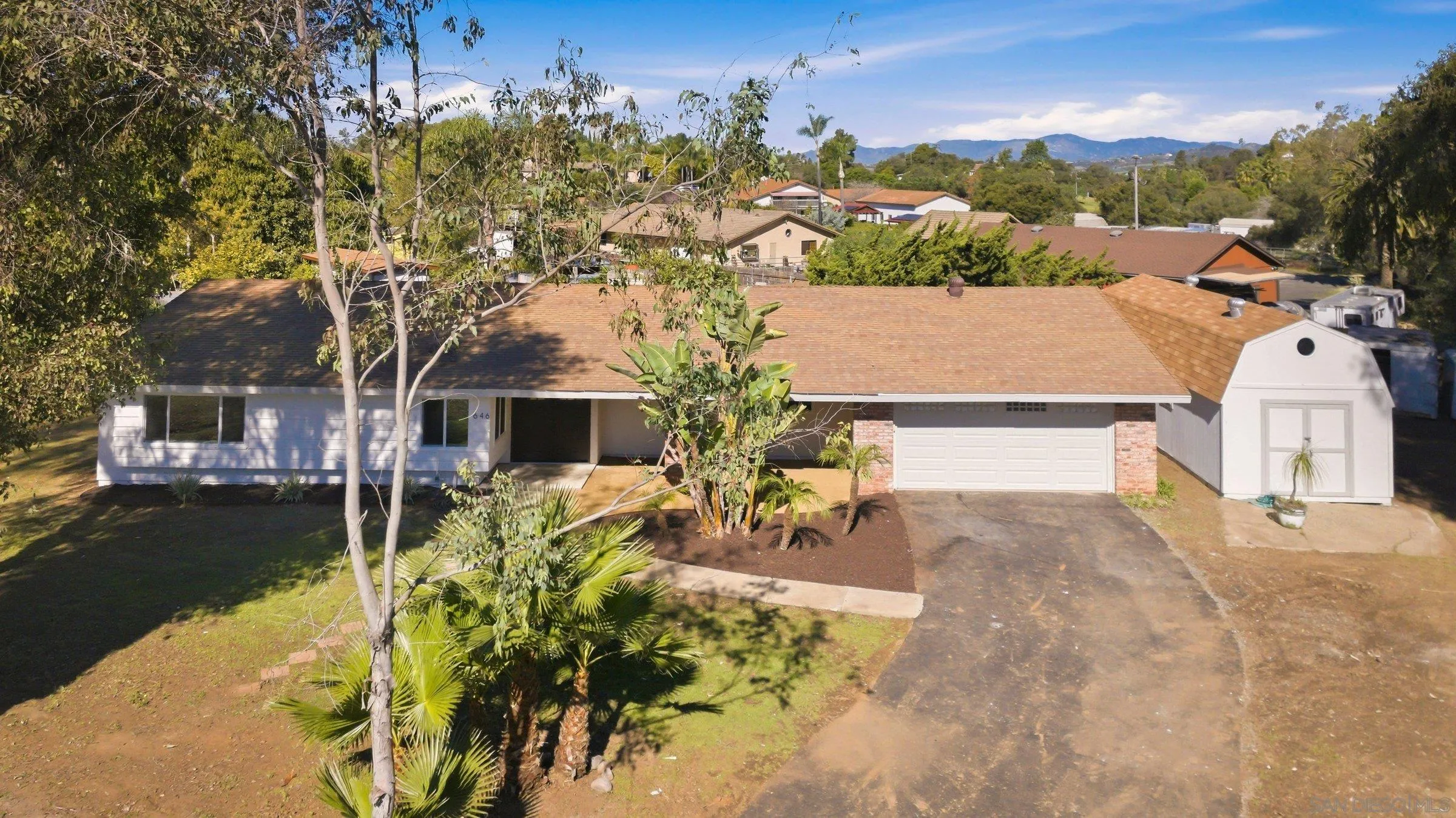 646 Barsby Street Vista, CA 92084 - Photo 48 of 48 a view of a house with a yard