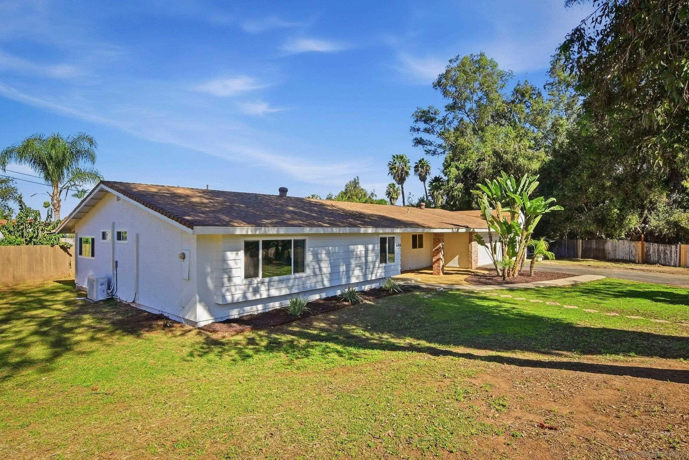 646 Barsby Street Vista, CA 92084 - Photo 8 of 48 front view of a house with a yard