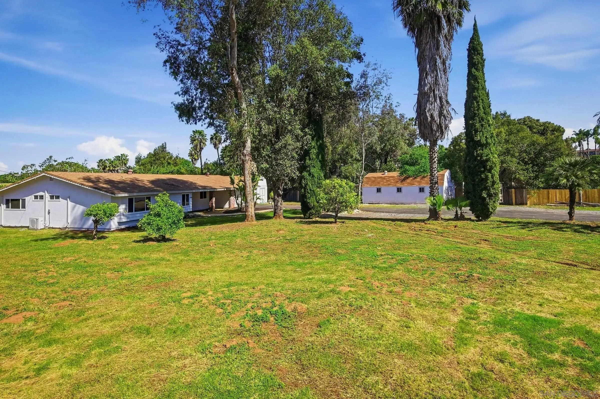 646 Barsby Street Vista, CA 92084 - Photo 10 of 48 a front view of a house with a yard