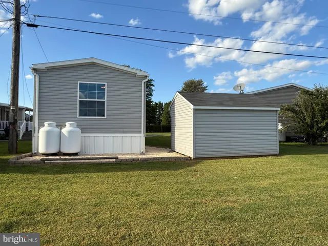 a view of a backyard of house