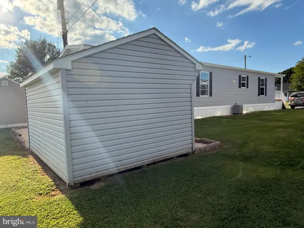 a view of a back yard of the house