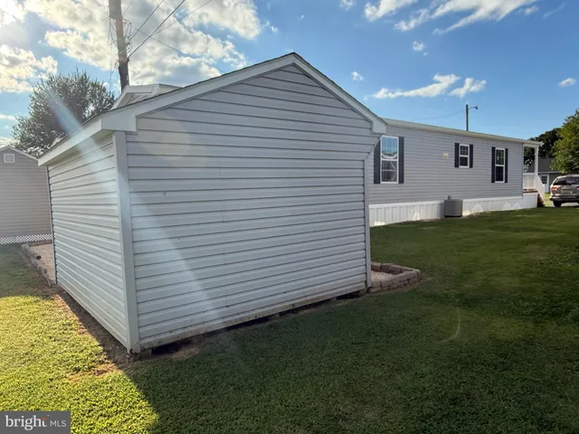 a view of a back yard of the house