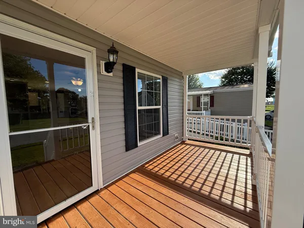 a view of a balcony with window