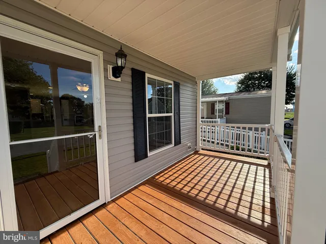 a view of a balcony with window