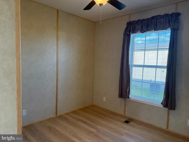 a view of kitchen with granite countertop cabinets a sink and dishwasher
