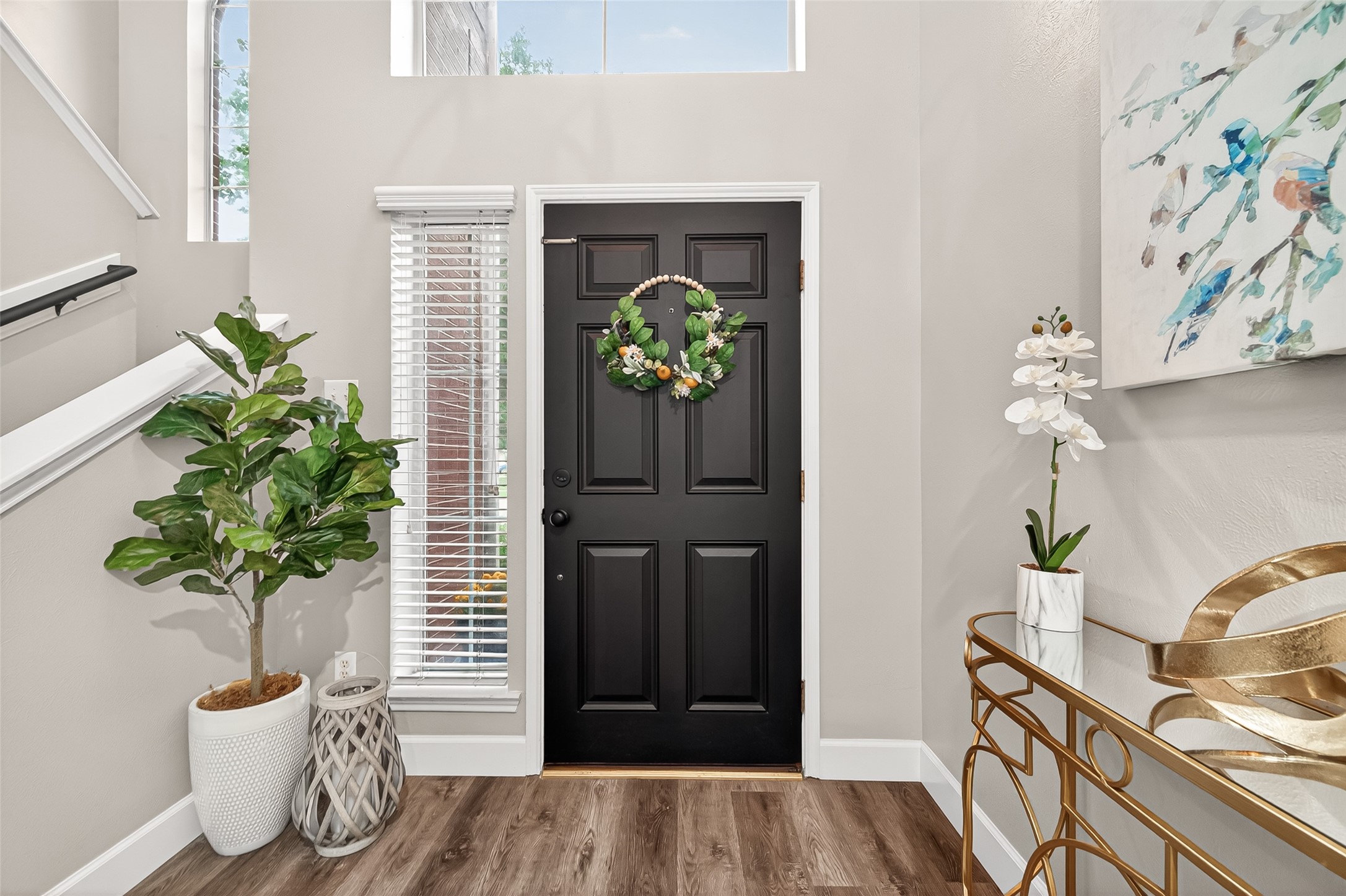 7415 Riven Oaks Court Cypress, TX 77433 - Photo 6 of 42 Welcoming front entryway opens to the second floor, highlighted by soaring ceilings and large glass windows that fill the space with abundant natural light.
