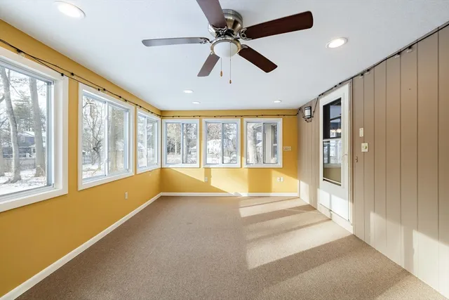 a view of an entryway with a chandelier