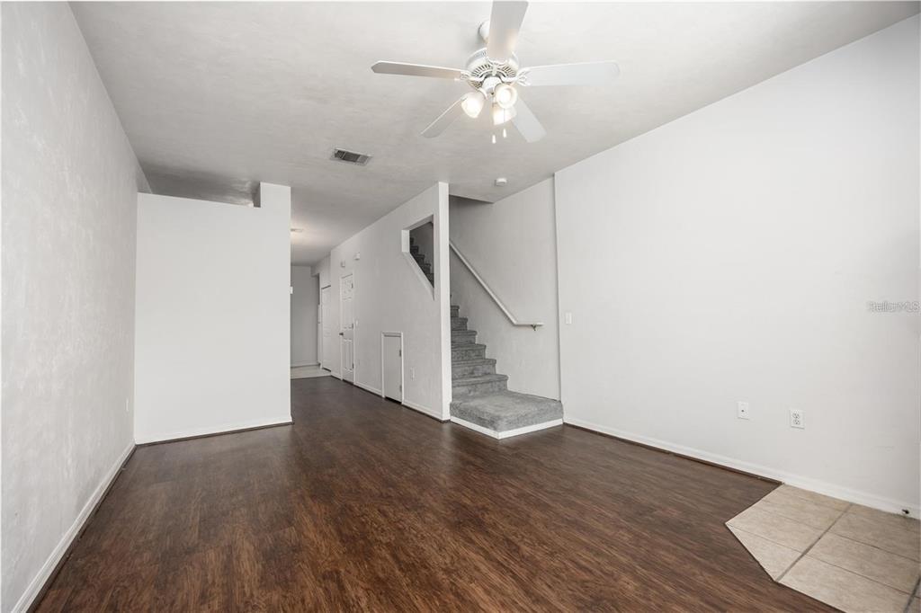 3510 Southwest 30th Way, Unit 158 Gainesville, FL 32608 - Photo 5 of 27 a view of an entryway with wooden floor
