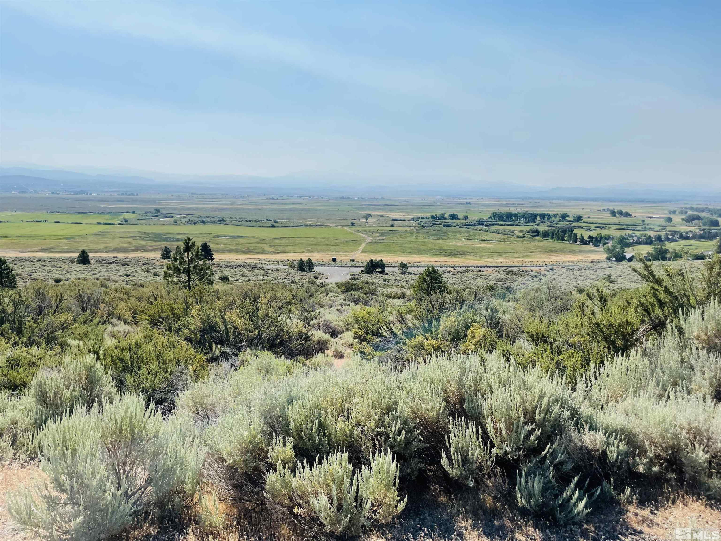 2533 Eagle Ridge Road, Unit 40 Genoa, NV 89411 - Photo 16 of 39 a view of a large body of water with a building in the background