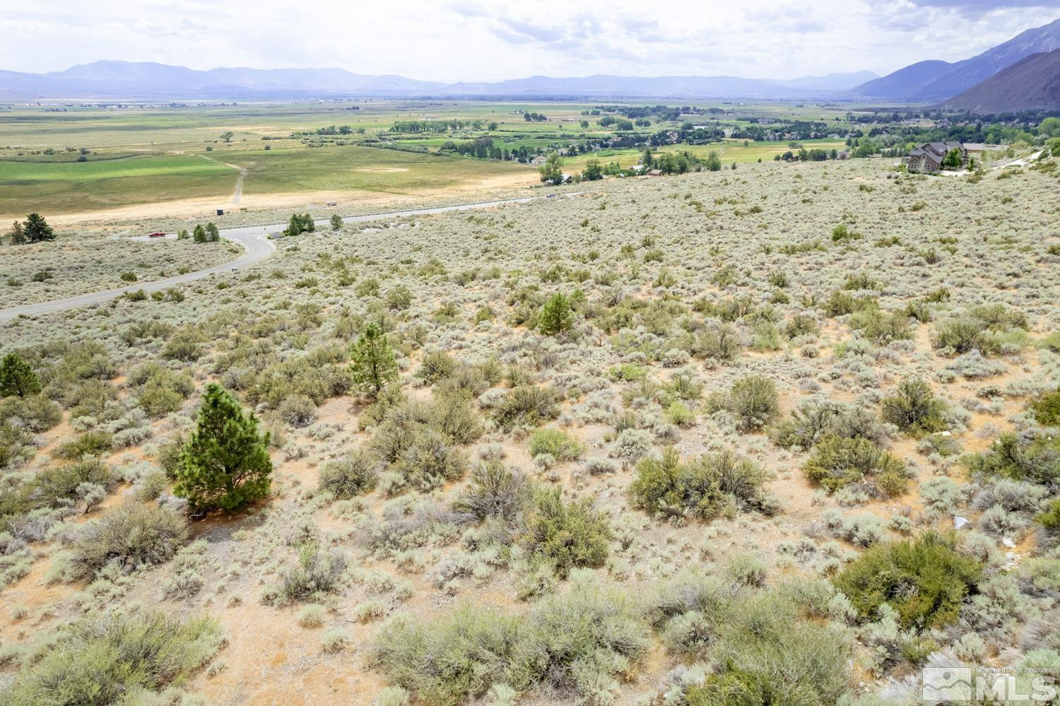 2533 Eagle Ridge Road, Unit 40 Genoa, NV 89411 - Photo 26 of 39 a view of an ocean with a mountain