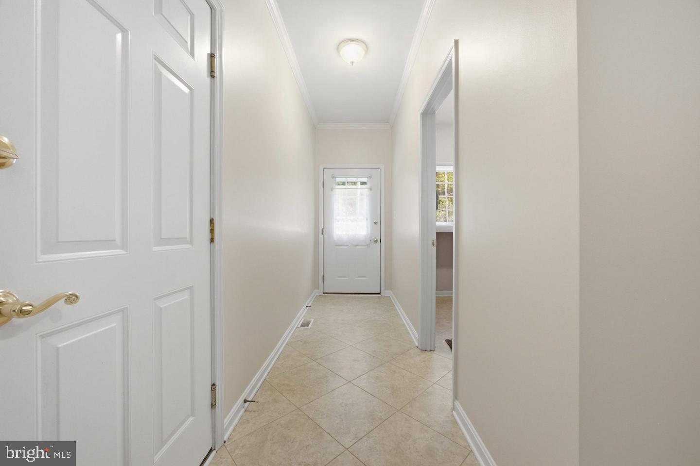 3723 Bay Road Street, MD 21154 - Photo 12 of 49 Mudroom area, side exit to driveway & laundry