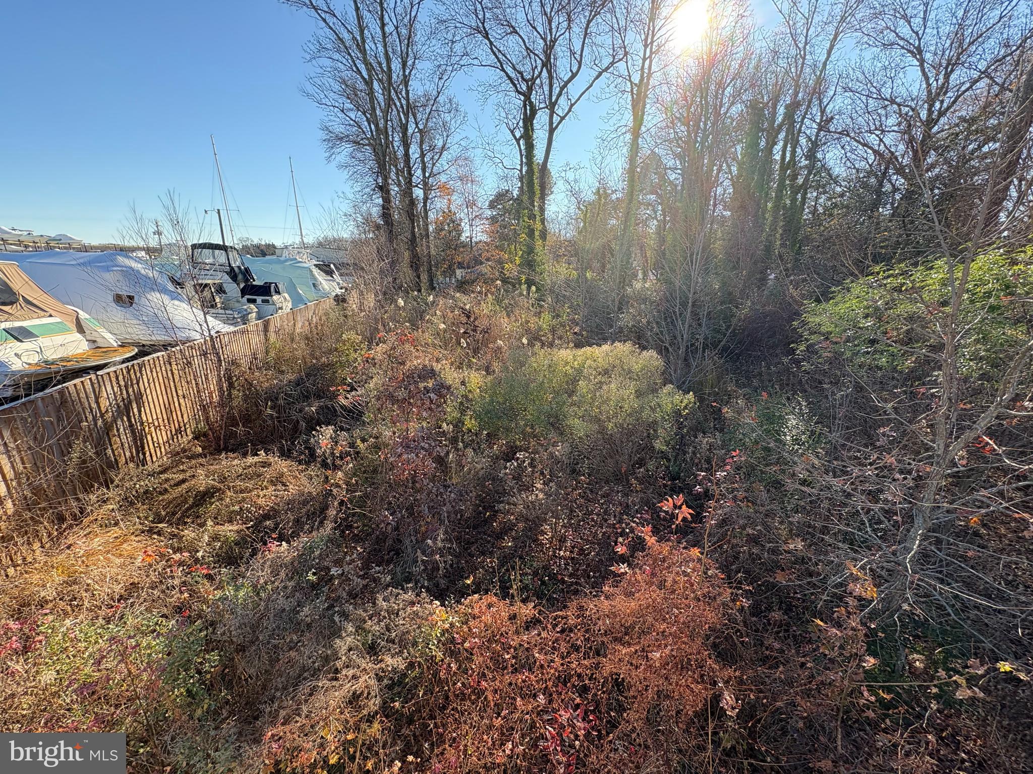 1055 Old Turkey Point Road Edgewater, MD 21037 - Photo 2 of 6 a view of a house with a yard