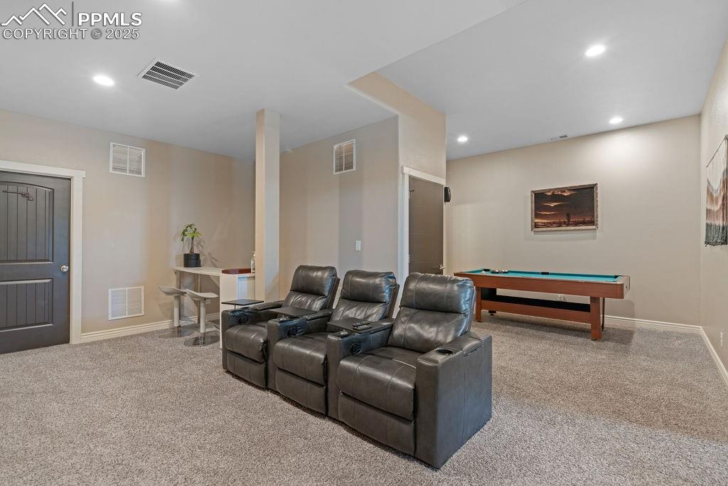 8450 Edison Road Yoder, CO 80864 - Photo 26 of 50 Cinema room featuring billiards, light colored carpet, and recessed lighting