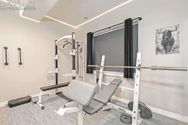 a bathroom with a sink a mirror and shower