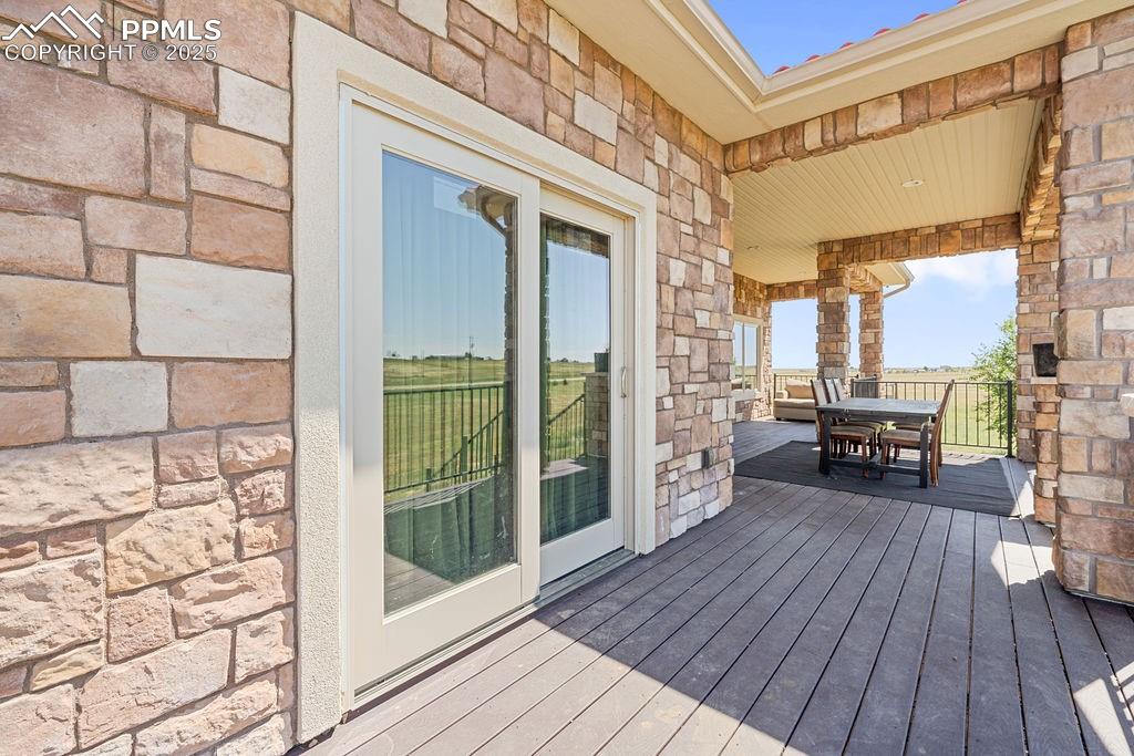 8450 Edison Road Yoder, CO 80864 - Photo 43 of 50 Wooden deck with outdoor dining space