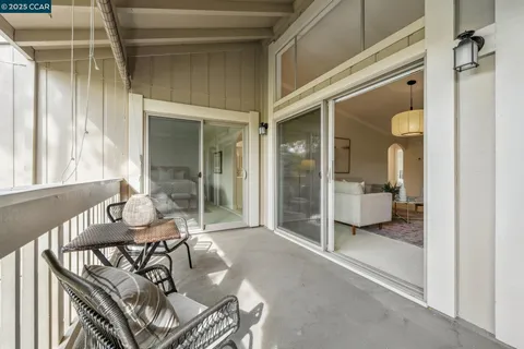 a view of a house with a tree