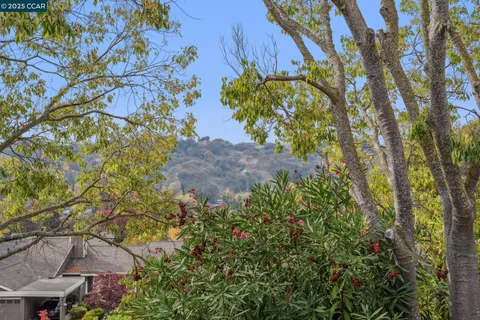 a view of a house with porch and wooden floor