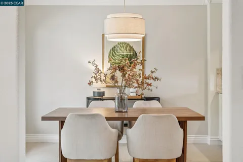 a dining room with wooden floor