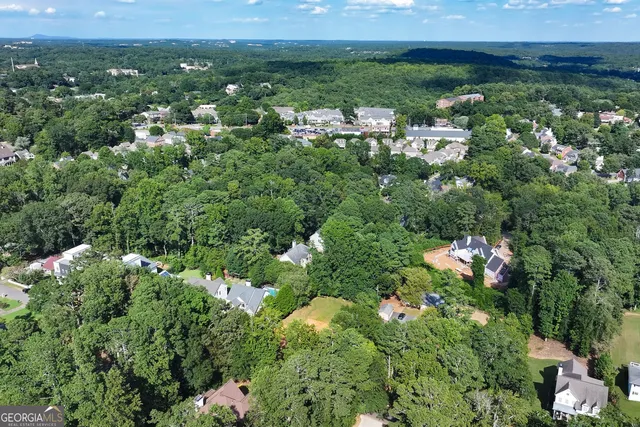 an aerial view of a city with lots of residential buildings