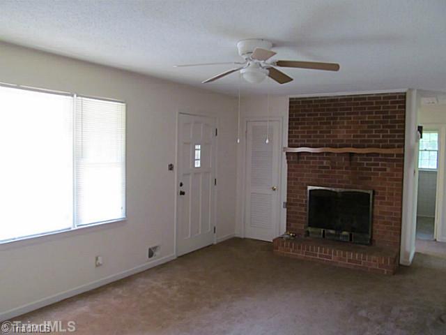 356 Christian Home Church Road Traphill, NC 28685 - Photo 3 of 16 Living Room. Large Living Room with wood fireplace. New Carpeting throughout