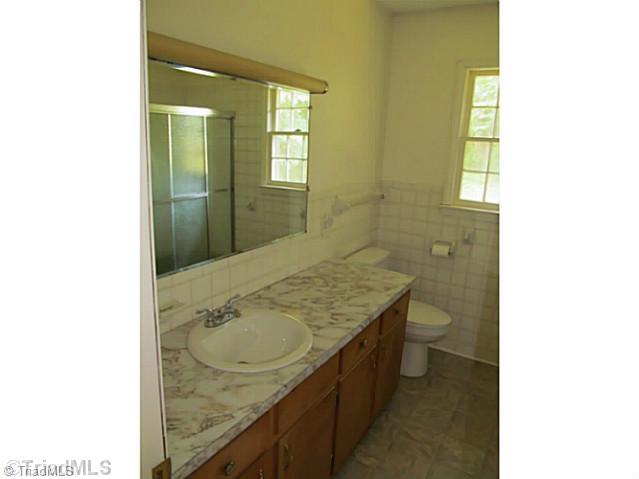 356 Christian Home Church Road Traphill, NC 28685 - Photo 4 of 16 Bath. Main Bath with new toilet & sink basin