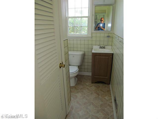 356 Christian Home Church Road Traphill, NC 28685 - Photo 5 of 16 Bath. Half bath with new vanity & toilet