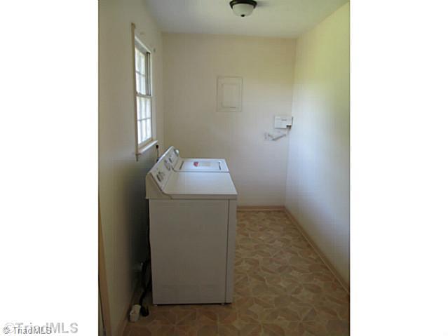356 Christian Home Church Road Traphill, NC 28685 - Photo 6 of 16 Laundry Room. Separate Laundry Room. Washer & Dryer convey