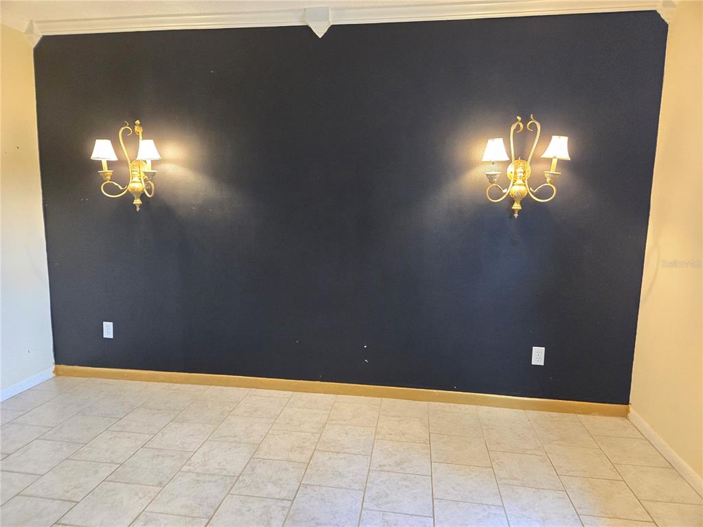 19 Spring Dr Place Ocala, FL 34472 - Photo 29 of 29 a view of a livingroom with a chandelier