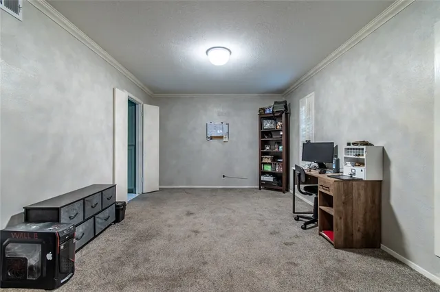 a view of a workspace with furniture