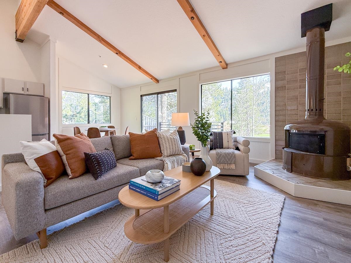 1560 Olympic Vly Road, Unit 14 Olympic Valley, CA 96146 - Photo 2 of 26 a living room with furniture and a large window