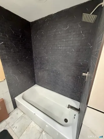 a bathroom with a bathtub