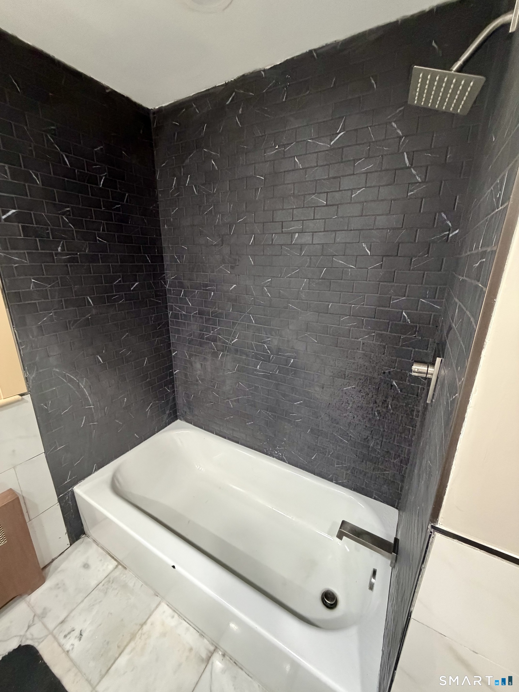 40 Nepaug Street Hartford, CT 06106 - Photo 11 of 19 a bathroom with a bathtub