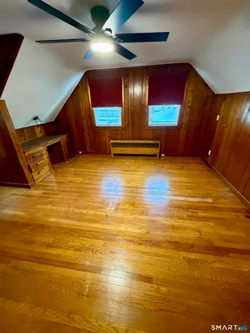 a room with furniture and a rug