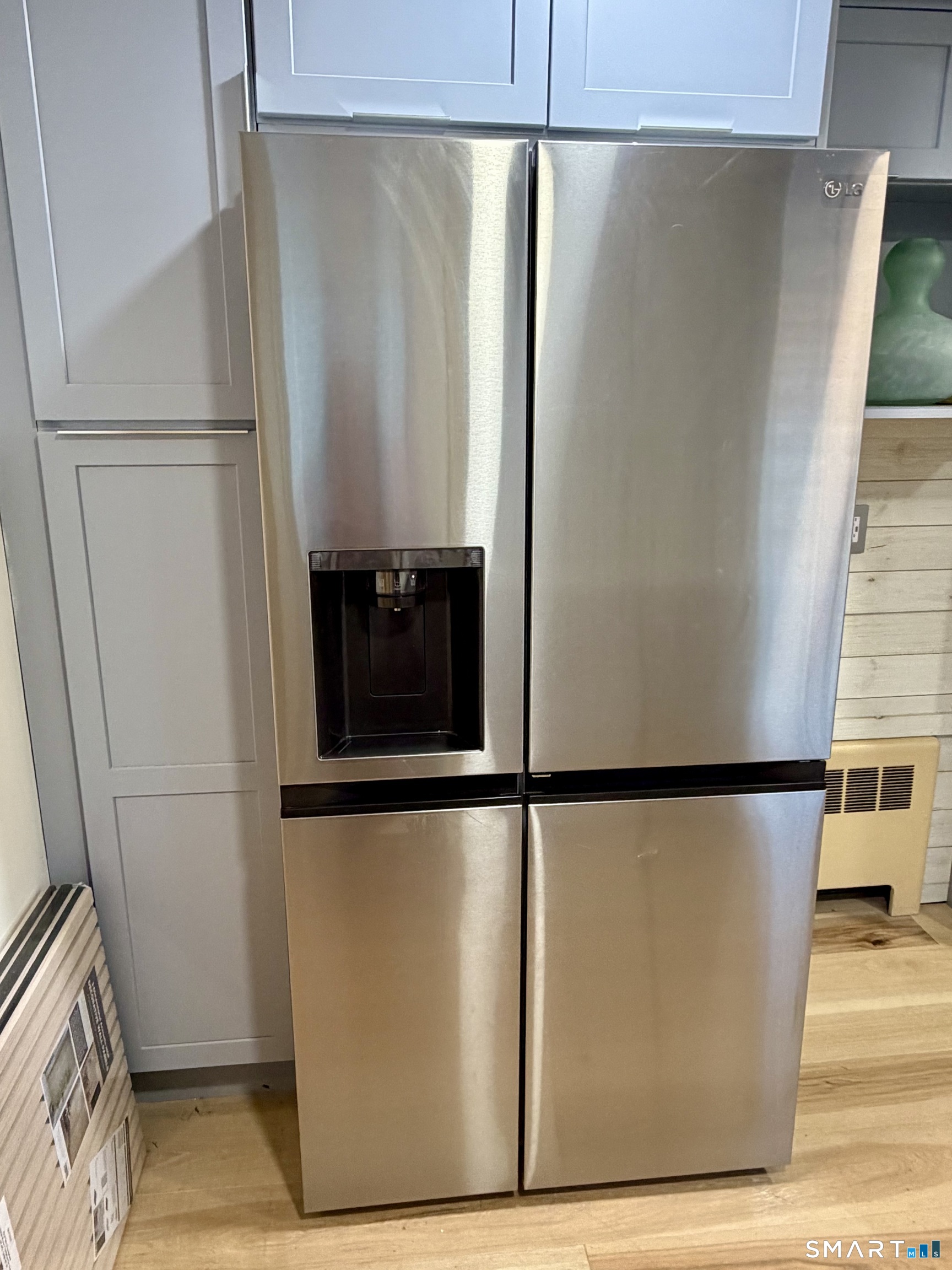 40 Nepaug Street Hartford, CT 06106 - Photo 4 of 19 a view of a refrigerator in an empty room