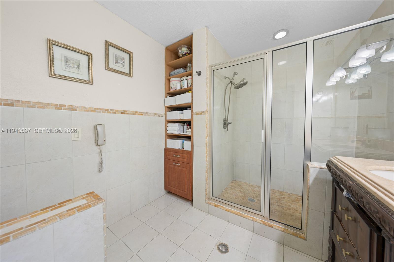 6423 Southwest 107th Place Miami, FL 33173 - Photo 24 of 37 a bathroom with a shower