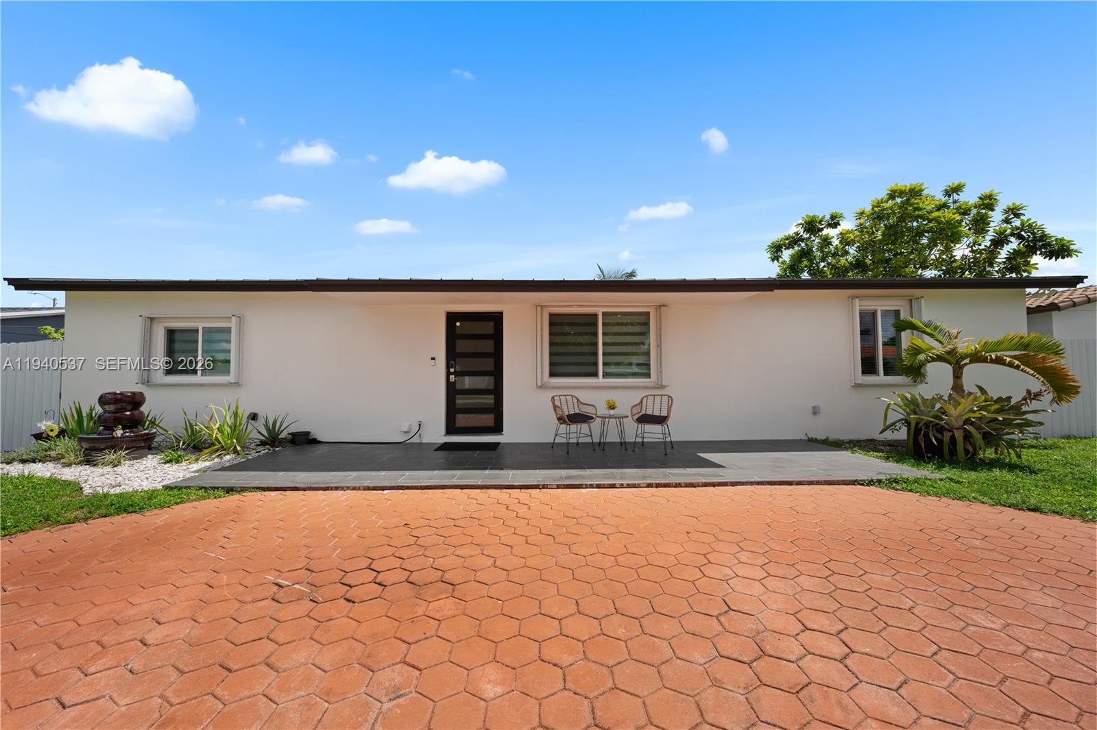 6423 Southwest 107th Place Miami, FL 33173 - Photo 3 of 37 a view of outdoor space and yard