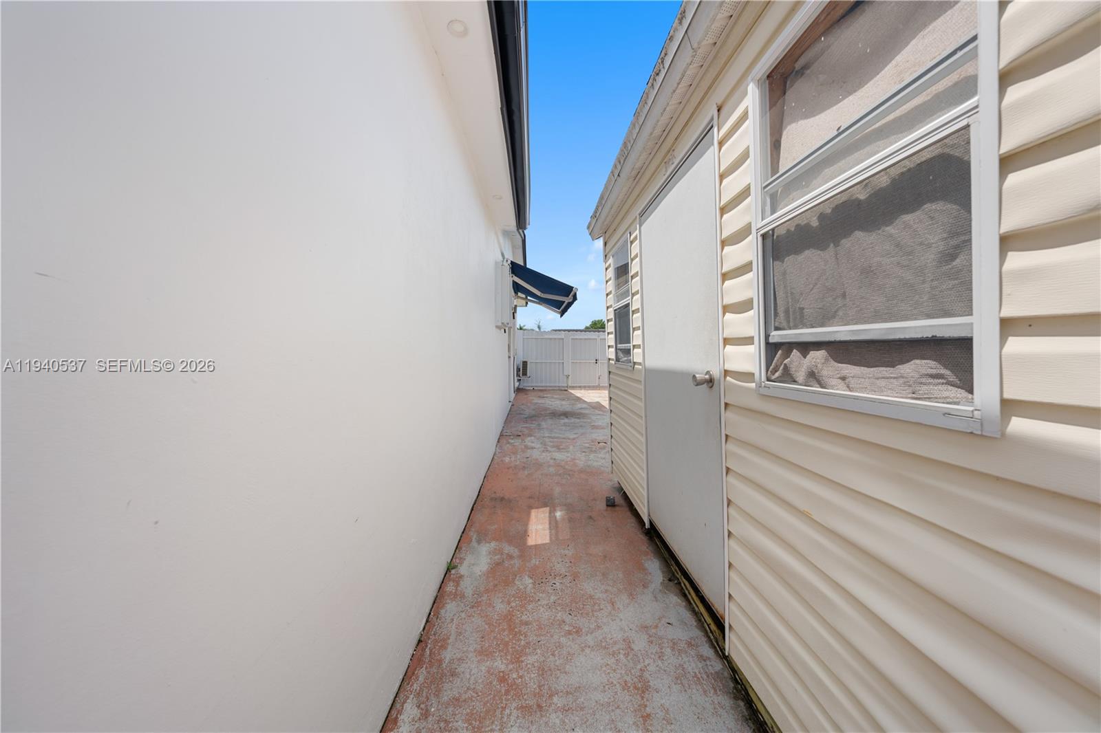 6423 Southwest 107th Place Miami, FL 33173 - Photo 33 of 37 a view of a hallway with wooden floor and staircase