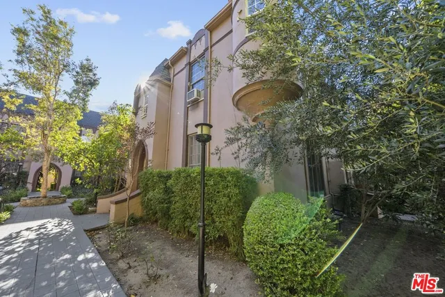 a house view with a outdoor space