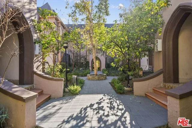 a view of a patio in backyard