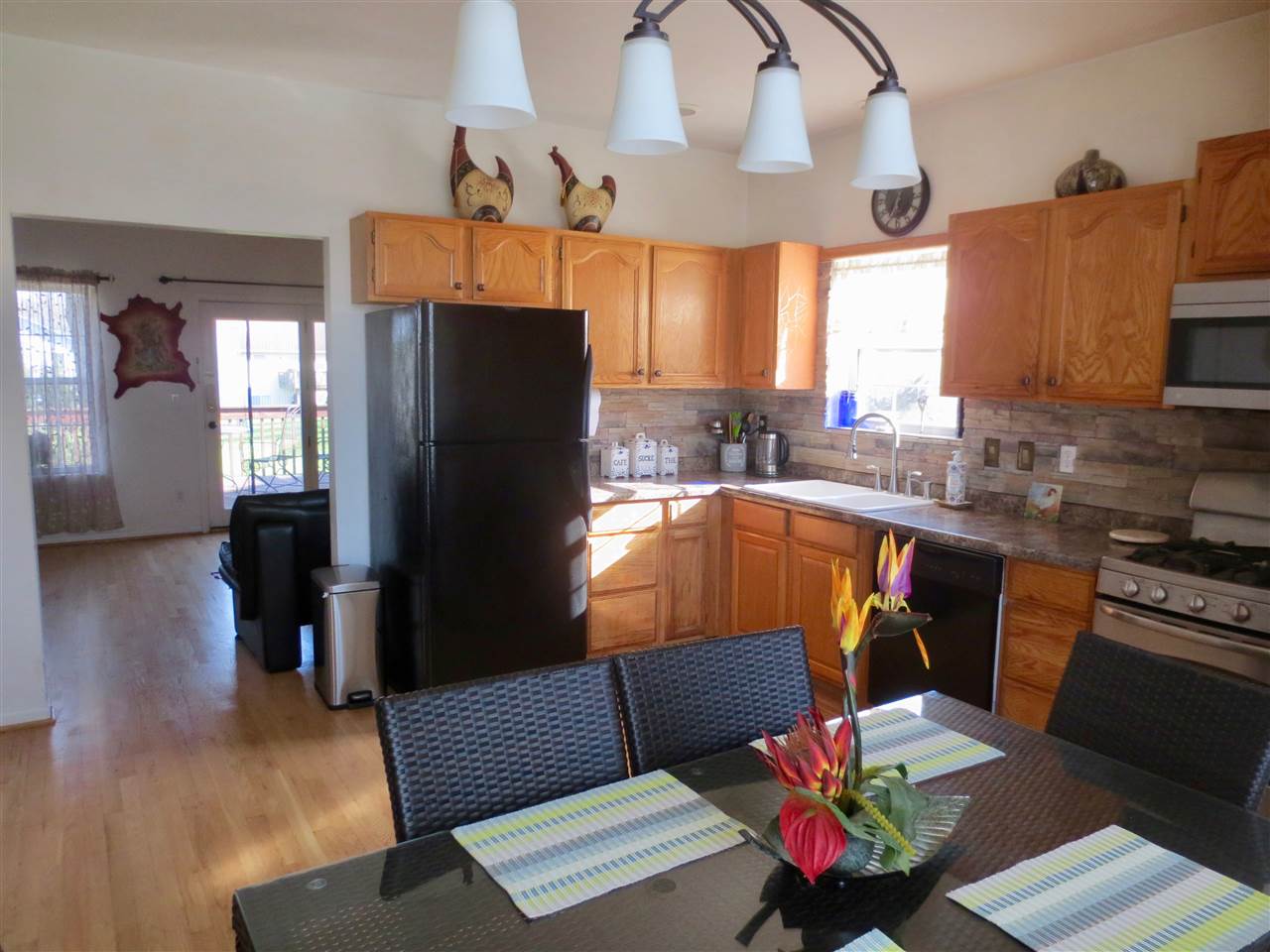 140 Pembroke Road Southwest Poplar Grove, IL 61065 - Photo 7 of 26 a living room with furniture and wooden floor