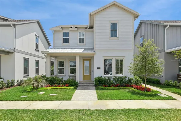front view of a house with a yard