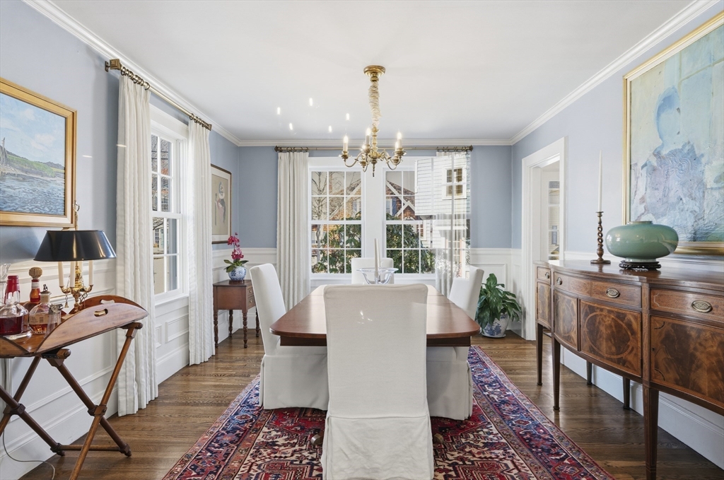 16 Pickwick Road Marblehead, MA 01945 - Photo 12 of 30 a living room with furniture and a chandelier