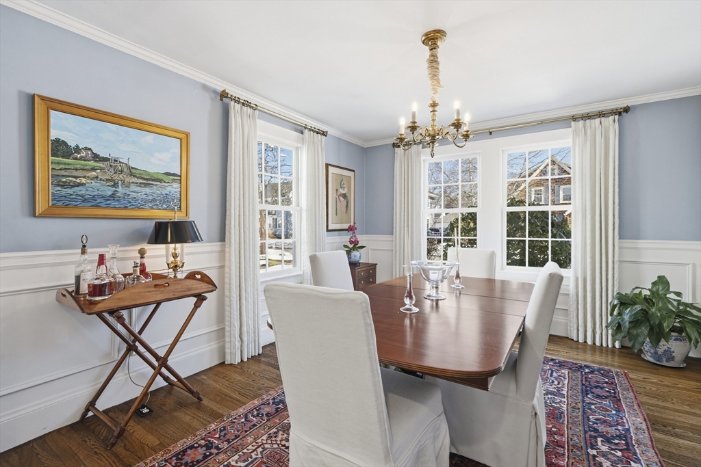 16 Pickwick Road Marblehead, MA 01945 - Photo 13 of 30 a dining room with furniture a chandelier and wooden floor
