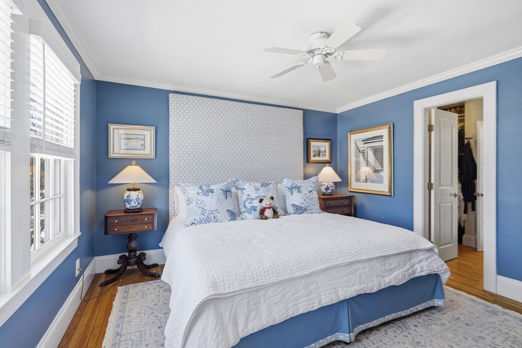 16 Pickwick Road Marblehead, MA 01945 - Photo 17 of 30 a bedroom with a bed and wooden floor