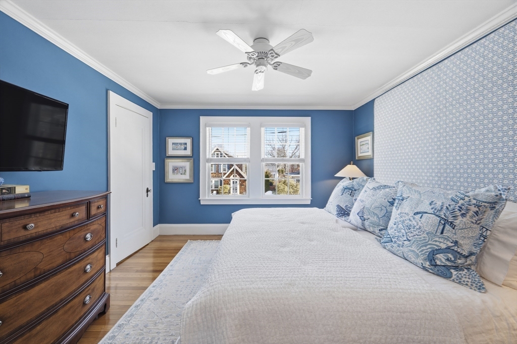 16 Pickwick Road Marblehead, MA 01945 - Photo 18 of 30 a bedroom with a large bed and a flat screen tv