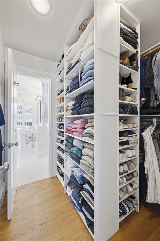 16 Pickwick Road Marblehead, MA 01945 - Photo 19 of 30 a view of walk in closet with clothes and shoes